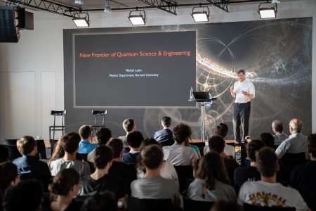 Scientist Mikhail Lukin giving a public talk. 