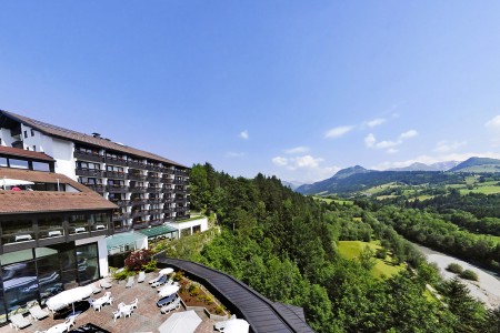 Panorama View of Hotel Allgäu Stern Sonthofen with Fields and Alps in the Background
