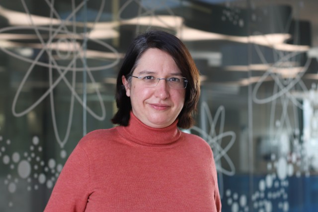 Profile photo of Prof. Leticia Taruell standing in front of a whiteboard. 