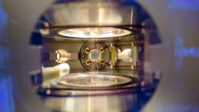 A close view inside the main vacuum chamber of the NaK molecules experiment. In the middle four high-voltage copper wires are routed to an ultrahigh-vacuum glasscell where the ultracold polar molecules were produced.