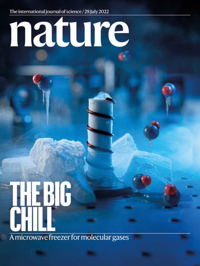 Nature journal cover featuring the image of a frozen microwave antenna, surrounded by frozen molecules.